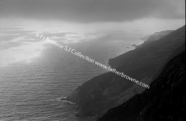 SLIEVE LEAGUE SUNLIGHT ON SEA THROUGH MIST AND CLIFFS